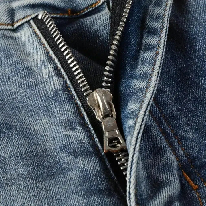 Black-patch whiskered jeans