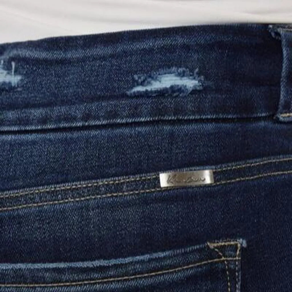 Distressed-hem sanded jeans for women