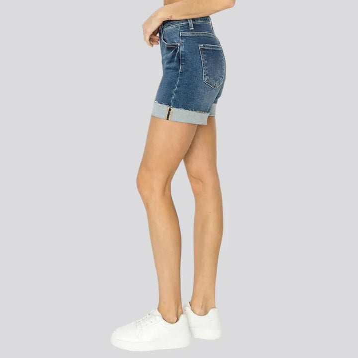Whiskered medium-wash denim shorts